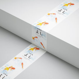 デザイン制作事例：福岡市博多区甘味処よし様包装用テープをデザインいたしました。